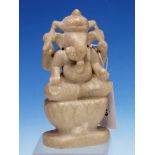 AN INDIAN WHITE MARBLE CARVING OF GANESH SEATED ON A LOTUS THRONE WITH HIS VAHANA MOUSE AT ITS BASE.