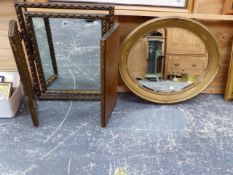 A GILT TRIPTYCH DRESSING TABLE MIRROR, TOGETHER WITH A OVAL EXAMPLE