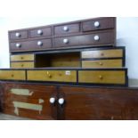 TWO ANTIQUE NESTS OF DRAWERS AND A SMALL CABINET.