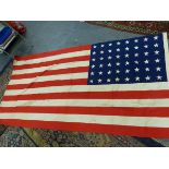 A UNITED STATES FLAG, FIRST HALF OF THE 20th C. PRINTED WITH 48 STARS. 139 x 268cms.