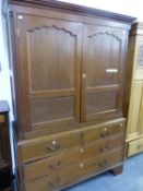 A GEORGE III OAK HANGING CUPBOARD WITH TWO DRAWER BASE ON BRACKET FEET.