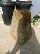 A STADDLE STONE BASE