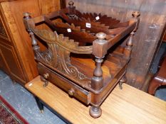 A VICTORIAN ROSEWOOD THREE COMPARTMENT CANTERBURY WITH SINGLE DRAWER