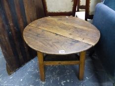 AN OAK CRICKET TABLE, THE THREE PLANK TOP ON LEGS JOINED BY A GALLERIED TRIANGULAR STRETCHER. Dia.