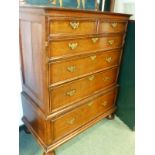 A GEORGIAN AND LATER OAK CHEST ON CHEST, THE UPPER PART WITH TWO SHORT AND THREE GRADED LONG DRAWERS