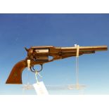 A PERCUSSION CAP SIX SHOT REVOLVER WITH BRASS TRIGGER GUARD, THE HEXAGONAL BARREL. 20cms.