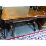 A VICTORIAN MAHOGANY SIDE TABLE, THE RECTANGULAR TOP ON BALUSTER COLUMNS AT EACH NARROW END WITH
