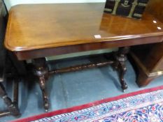 A VICTORIAN MAHOGANY SIDE TABLE, THE RECTANGULAR TOP ON BALUSTER COLUMNS AT EACH NARROW END WITH