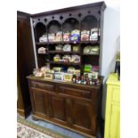 AN 18TH C AND LATER OAK DRESSER WITH ASSOCIATED RACK. W 131 X D 49 X H 198CMS.