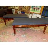A PAIR OF MAHOGANY REGENCY STYLE BENCHES OR DOUBLE STOOLS, EACH WITH GREY UPHOLSTERED SEAT CLOSE NAI