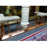 A COPPER CLUB FENDER, THE UPHOLSTERED SEATS AT EACH END ON SQUARE COLUMNS AND THE PLINTH FOOT. W 176