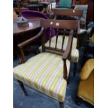 AN ANTIQUE SHERATON STYLE PAIR OF LINE INLAID MAHOGANY DINING CHAIRS WITH REEDED ARMS AND ON TAPERIN