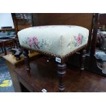 A MAHOGANY STOOL WITH FLORAL NEEDLE WORK SEAT ABOVE BALUSTER TURNED LEGS