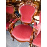 TWO SIMILAR VICTORIAN MAHOGANY SHOW FRAME ARMCHAIRS, THE BACK PADS, ELBOW RESTS AND SEATS UPHOLSTERE
