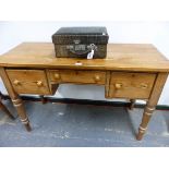 A VICTORIAN PINE THREE DRAWER SIDE TABLE ON TURNED LEGS. W 122 X D 50 X H 79cms.