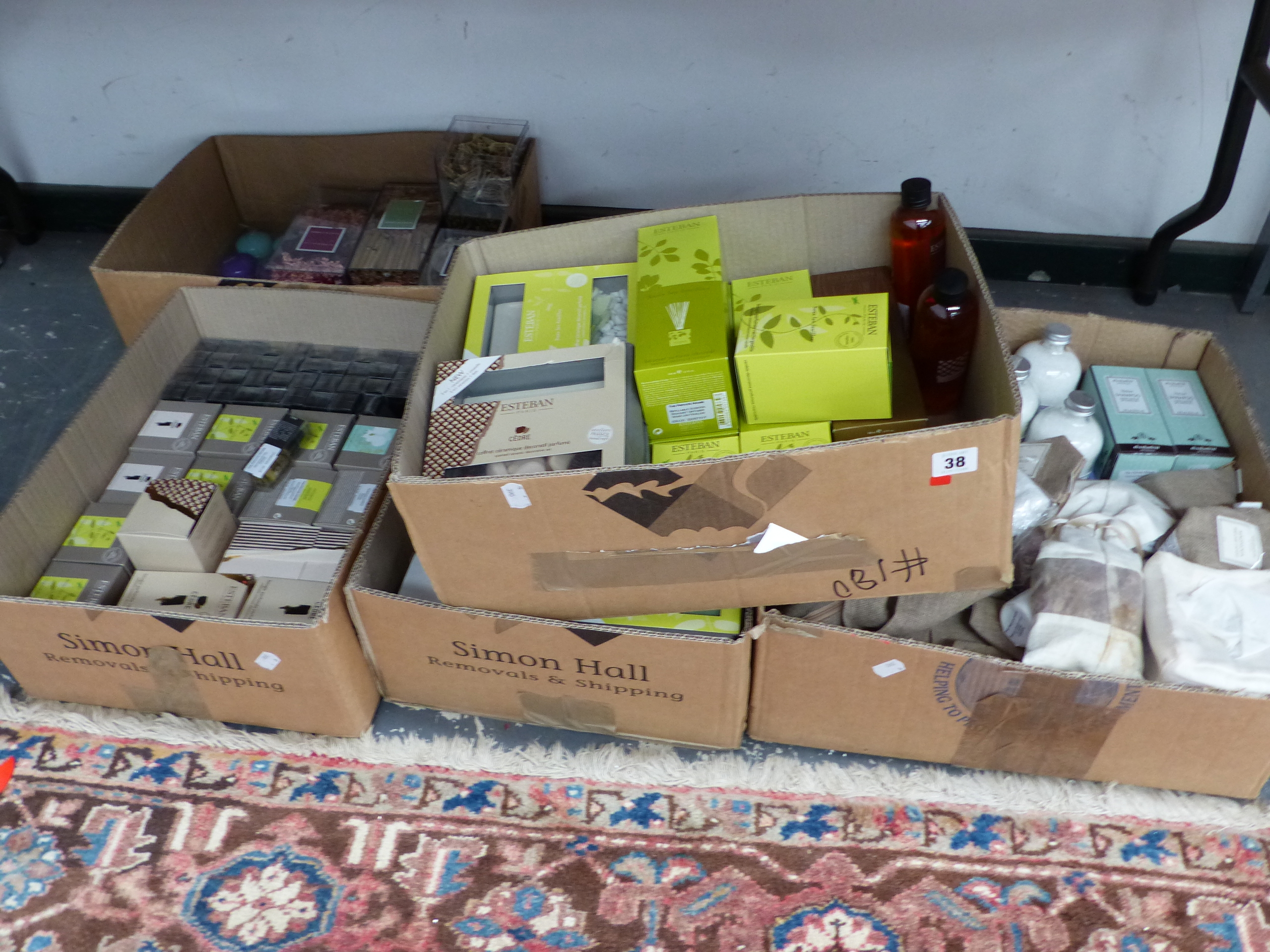 A LARGE QUANTITY OF SCENTED CANDLES, SHAMPOOS, ETC.