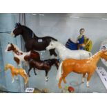 SIX BESWICK HORSE FIGURES, AND AN ART DECO STYLE FIGURINE.