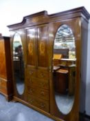 A LARGE EDWARDIAN INLAID COMPACTUM WARDROBE. W 192 X D 51 X H 217CMS.