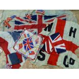 A UNION FLAG, THE SEPARATE COLOUR STRIPS SEWN TOGETHER. 10 x 210cms. A STRING OF BUNTING AND A