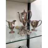 A SILVER PLATED THREE PIECE COFFEE SET, SILVER HANDLED SALAD SERVERS AND FOUR SILVER MOUNTED SHOE