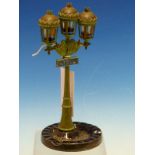 A CORDAY SCENT BOTTLE HOLDER AND ASHTRAY MODELLED AS A THREE LIGHT STREET LAMP FROM RUE DE LA