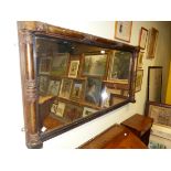 AN ANTIQUE RECTANGULAR MIRROR IN GILT COLUMNAR MOULDED FRAME. 69 x 135cms.