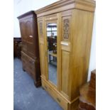 AN EDWARDIAN SATIN WALNUT SMALL WARDROBE. W 116 X D 46 X H 198CMS.