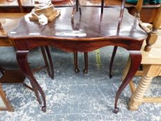 A MAHOGANY THREE TIER CAKE STAND, A ROSEWOOD CANDLESTICK TABLE LAMP AND A WAVY RECTANGULAR TOPPED