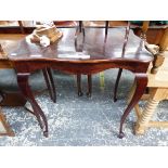 A MAHOGANY THREE TIER CAKE STAND, A ROSEWOOD CANDLESTICK TABLE LAMP AND A WAVY RECTANGULAR TOPPED