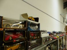 A LARGE COLLECTION OF COLLECTORS CARS TO INCLUDE BURAGO, MAISTO, SOLIDO, ETC.