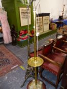 TWO BRASS STANDARD LAMPS ONE MOUNTED ONTO A CIRCULAR MAHOGANY BASE THE OTHER ON A TRIPOD