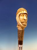 A CALAMANDER WOOD WALKING CANE WITH HALLMARKED SILVER PRESENTATION BAND AND IVORY HANDLE CARVED AS