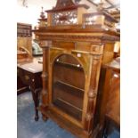 A VICTORIAN WALNUT GLAZED CABINET FORMERLY HOUSING A POLYPHON MUSIC DISC PLAYER. W 79 X D 41 X H