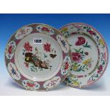 TWO CHINESE FAMILLE ROSE PLATES VARIOUSLY PAINTED WITH FLOWERS. Dia. 23cms.