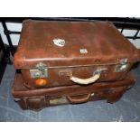 A LEATHER SUITCASE TOGETHER WITH ANOTHER SUITCASE