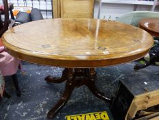 A VICTORIAN WALNUT QUARTER VENEERED OVAL TABLE EBONY LINE INLAID ABOUT FLORAL DIAMONDS SUPPORTED ON