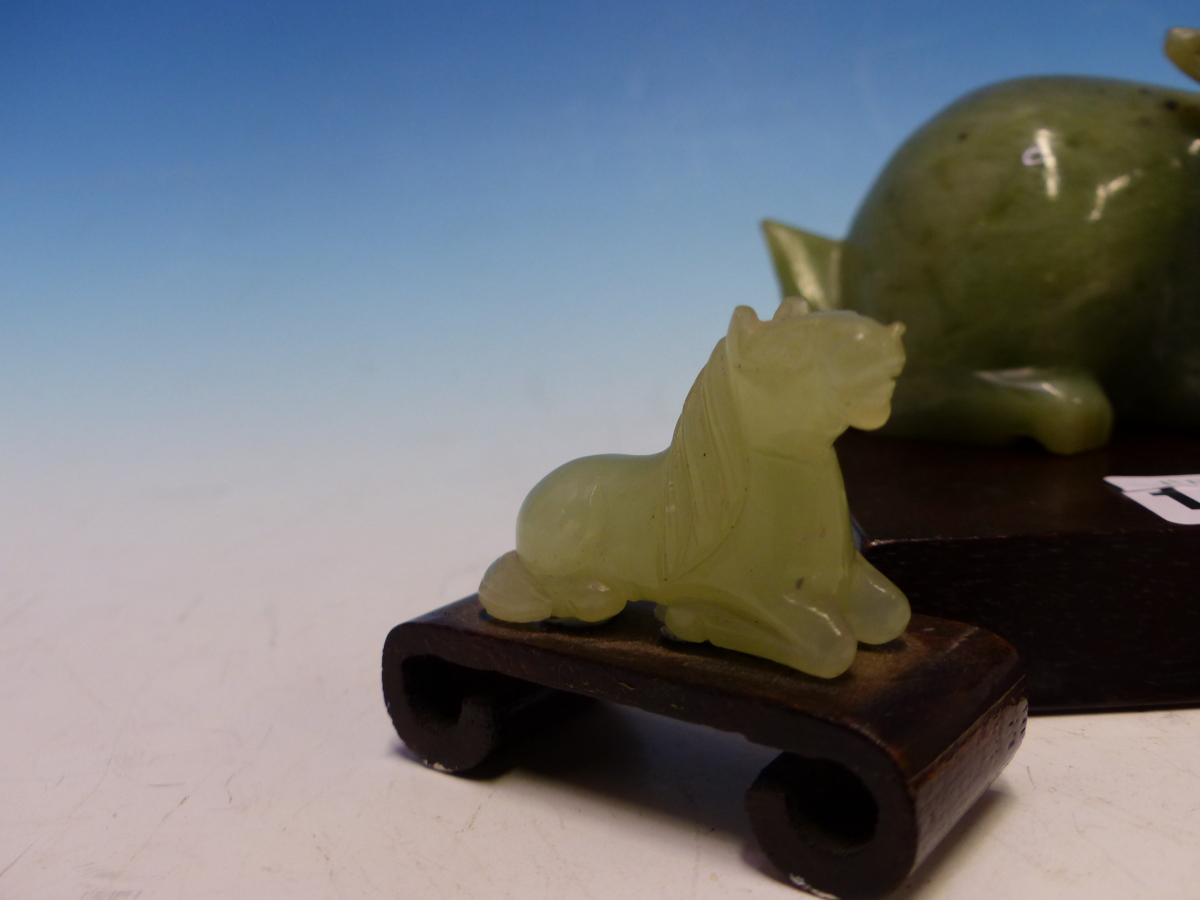 A CHINESE GREEN AND BLACK BOWENITE CARVING OF A RABBIT. W 13cms. TOGETHER WITH TWO GREEN STONE - Image 3 of 7