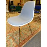 A SET OF EIGHT CHARLES EAMES DESIGN VITRA CHAIRS WITH GREY UPHOLSTERY WITHIN WHITE PLASTIC BACKS AND