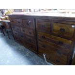 A LARGE HARDWOOD MULTI DRAWER CHEST WITH IRON HANDLES. W 146 X D 44 X H 119CMS, TOGETHER WITH A