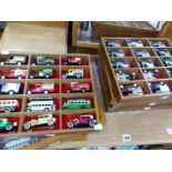 A COLLECTION OF VINTAGE DIE CAST ADVERTISING VEHICLES IN DISPLAY BOXES.