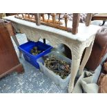 A GREY PAINTED CONSOLE TABLE, THE WAVY APRON CARVED WITH FOLIAGE ABOVE CABRIOLE LEGS WITH STYLISED