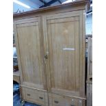 A LAE VICTORIAN ASH WARDROBE, WITH DOORS ENCLOSING HANGING SPACE ABOVE TWO DRAWERS. W 146 x D 41
