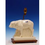 A WEDGWOOD JOHN SKEAPING WHITE GLAZED FIGURE OF A BISON MOUNTED ON A WOODEN PLINTH BACKED BY THE LAM