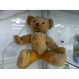 A VINTAGE JOINTED TEDDY BEAR BY DEANS