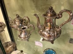 A VICTORIAN HALLMARKED SILVER FOUR PART COFFEE AND TEA SET. THE TEAPOT, SUGAR BOWL AND CREAMER DATED