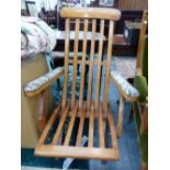 A VINTAGE BEECH SLAT BACK AND SEAT STEAMER ARMCHAIR, THE ARMS UPHOLSTERED