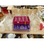 TWO BOX SETS OF WINE GLASSES, QUANTITY OF DECANTERS, PERFUME BOTTLES ETC.