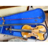 A VINTAGE STADIVARIUS PATTERN VIOLIN, BOW AND CASE. L.O.B 40cms.