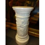 A LARGE POTTERY RELIEF DECORATED PEDESTAL. DIAMETER DIAMETER 36 X H 86cms.