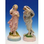 TWO TINTED PARIAN FIGURES OF LADIES, ONE SIPPING NECTAR FROM A MORNING GLORY FLOWER AND THE OTHER
